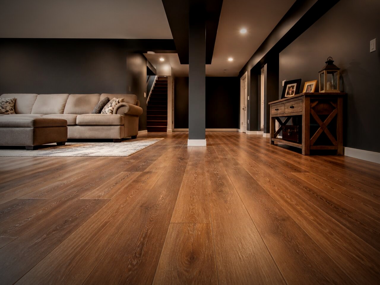 Finished basement with warm brown waterproof luxury vinyl plank flooring